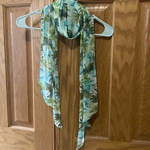 Women’s blue and green floral scarf.